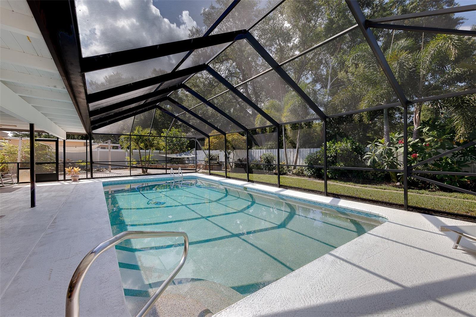 Beautiful pool in lush backyard