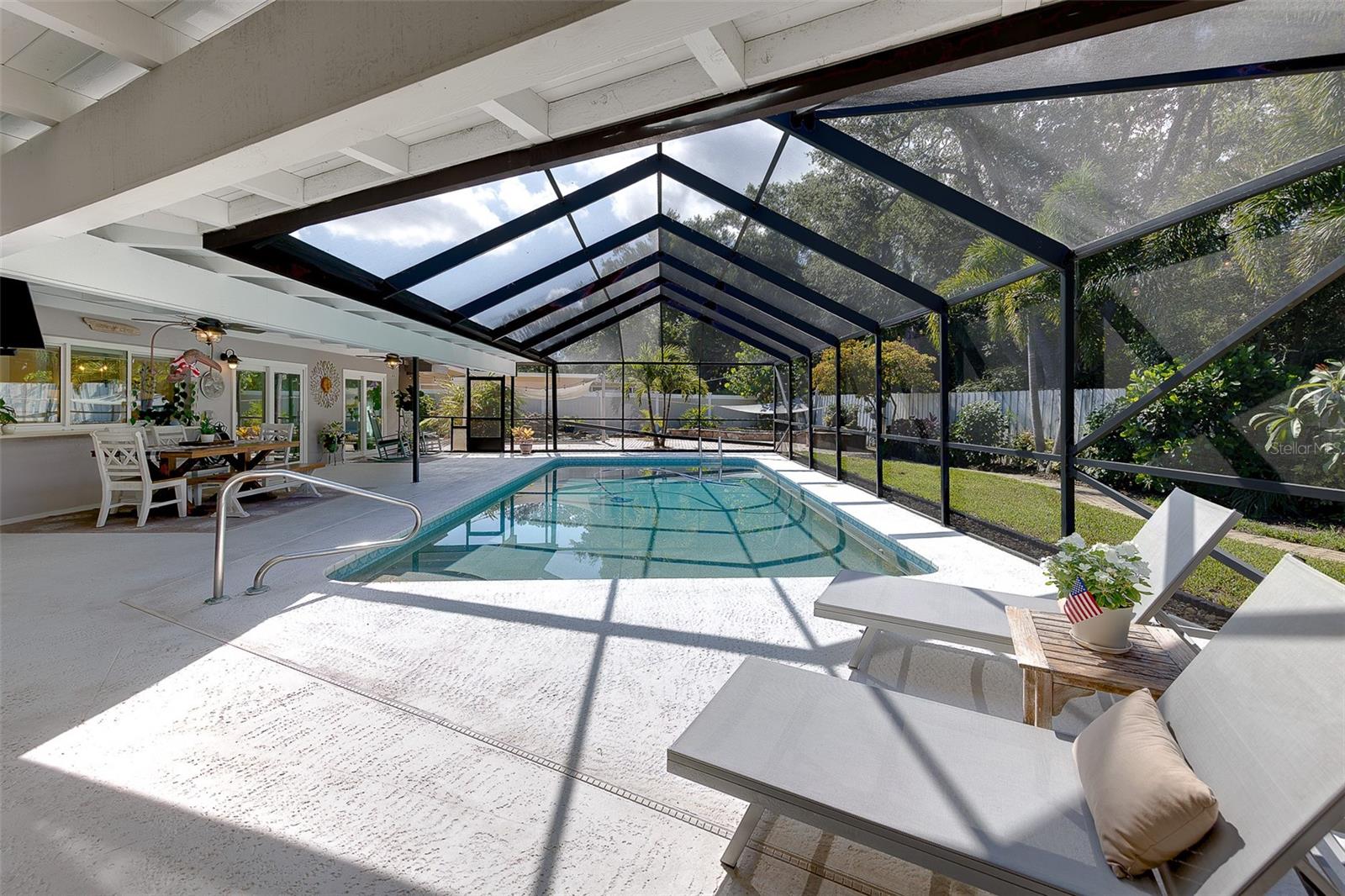 Sundays just got a lot better with this pool area - perfect for grilling, relaxing or entertaining