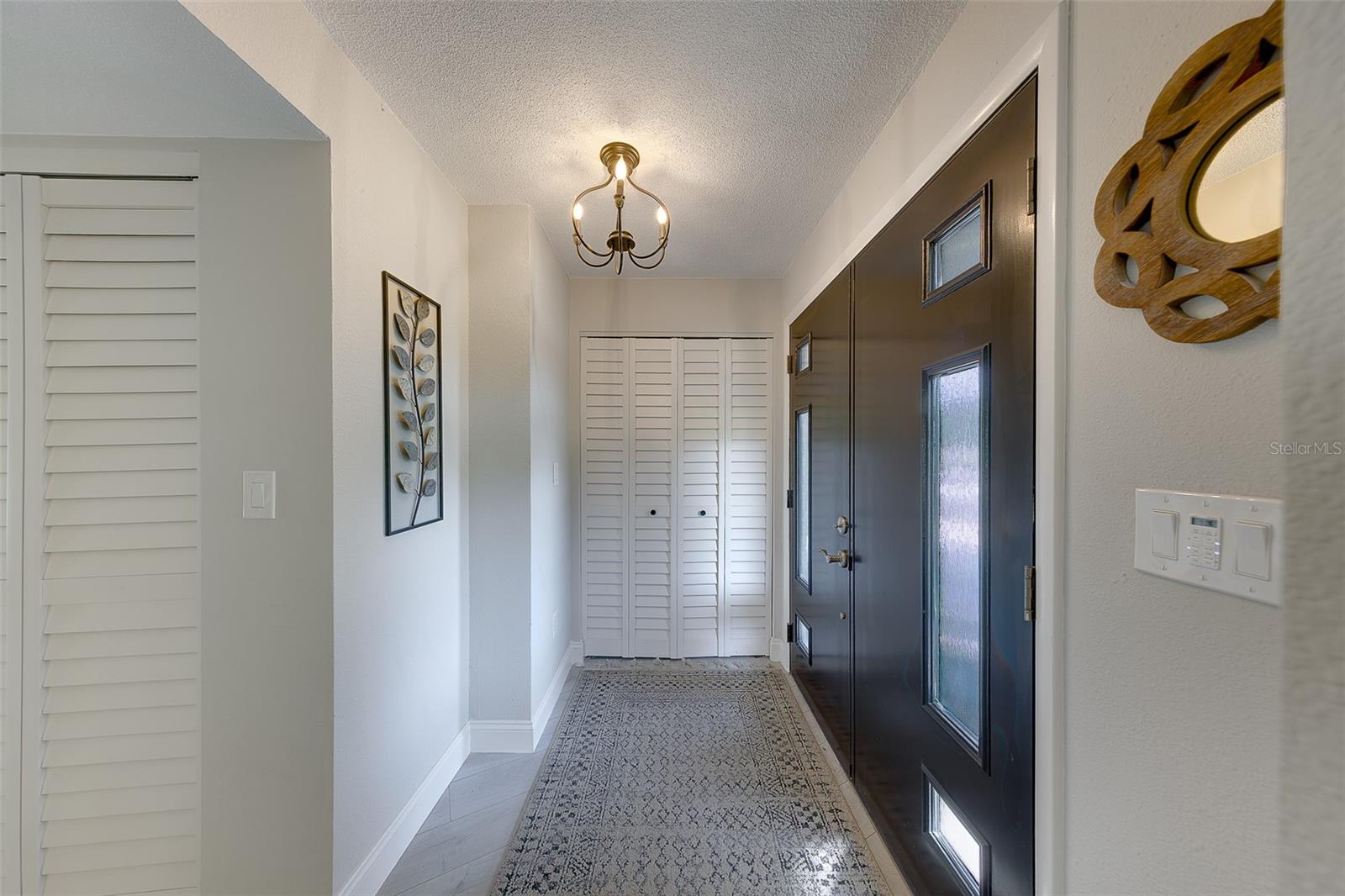 Front entrance with ample closet space