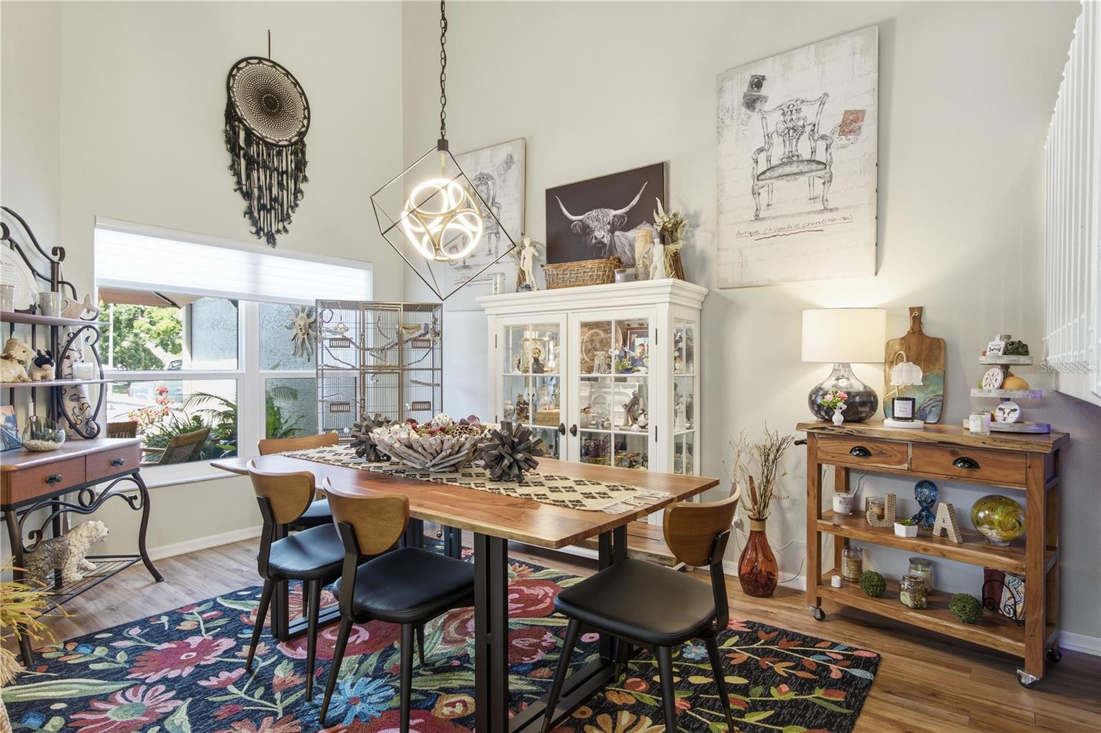 Dining area has double floor ceiling! Impressive!