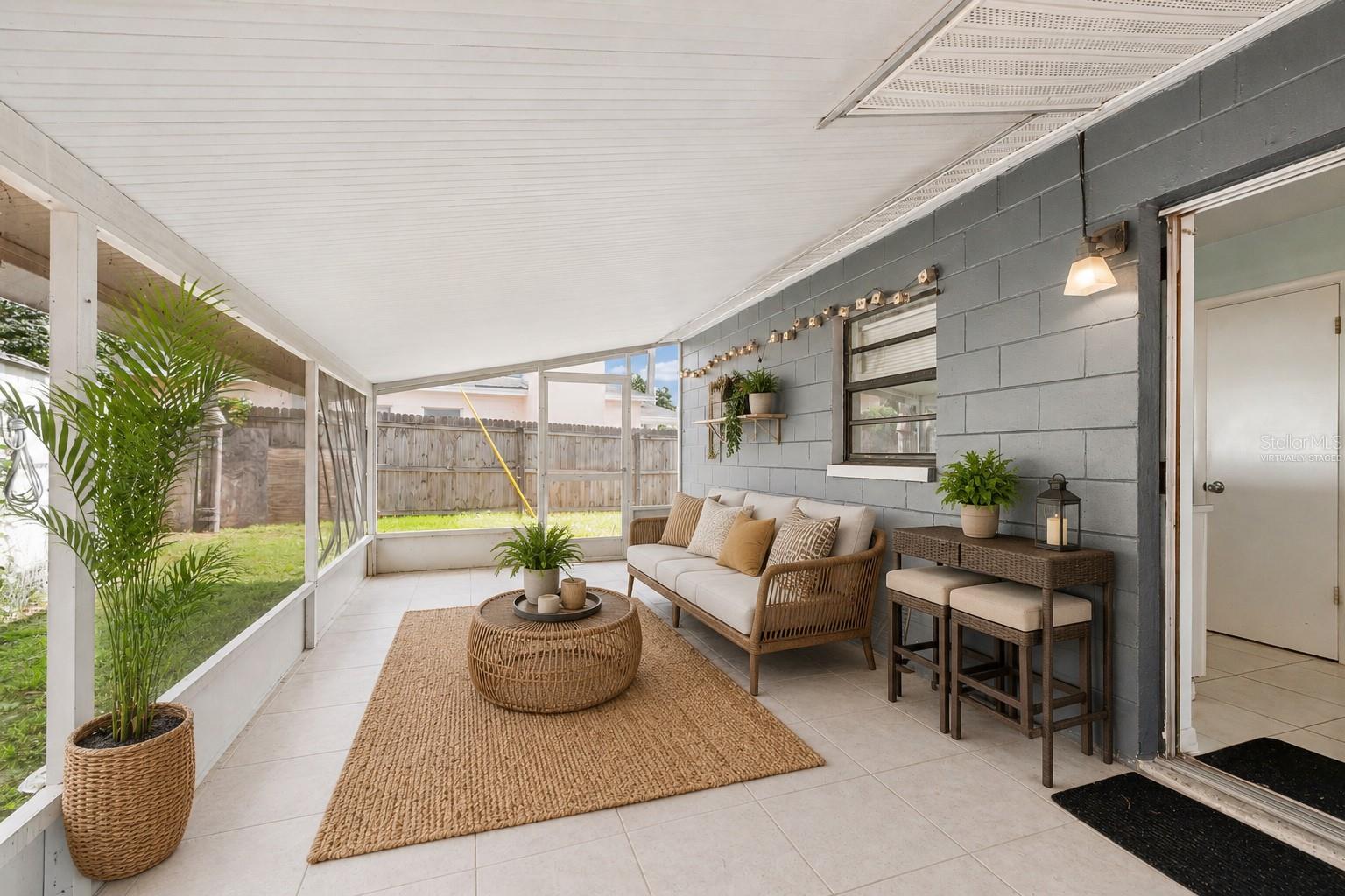 BACK PORCH *VIRTUALLY STAGED & CLEANED USING AI*