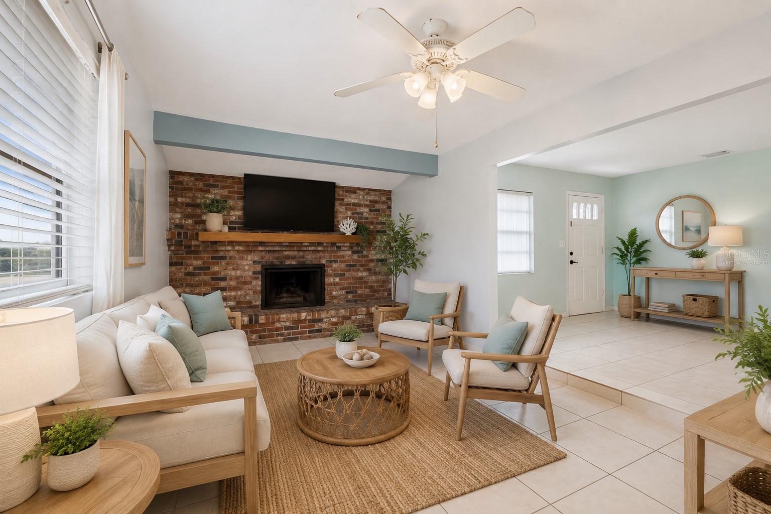 LIVING ROOM WITH FIREPLACE *VIRTUALLY STAGED*