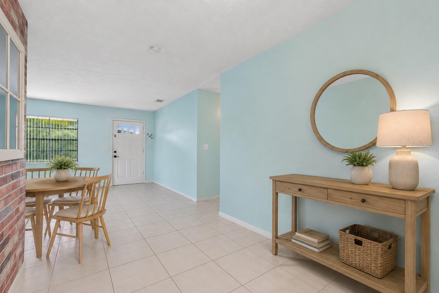 FRONT ENTRY ROOM WITH DINING SPACE *VIRTUALLY STAGED*