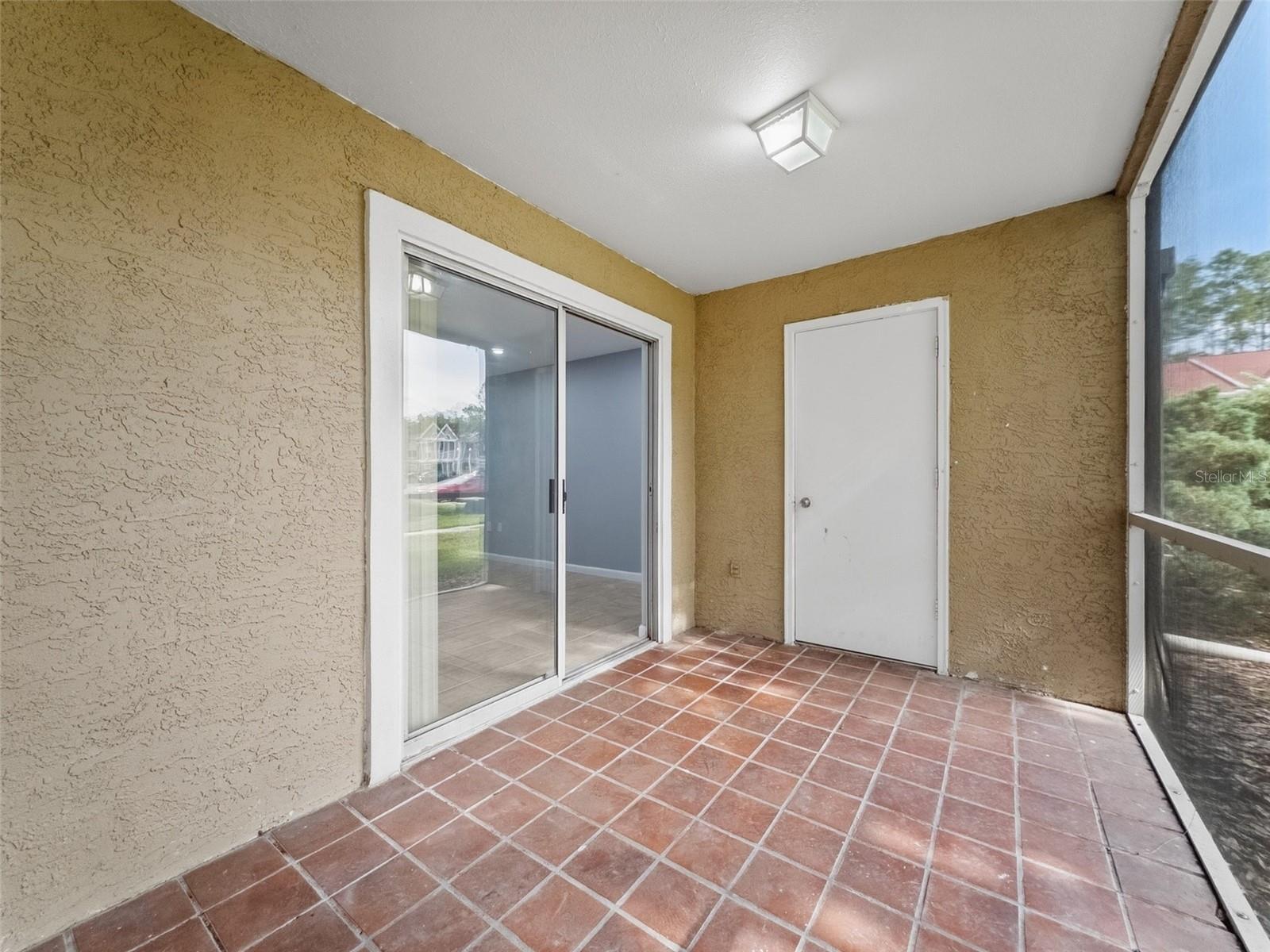 Screened Patio with Storage - 9481 Highland Oak Drive #1502, Tampa, FL 33647