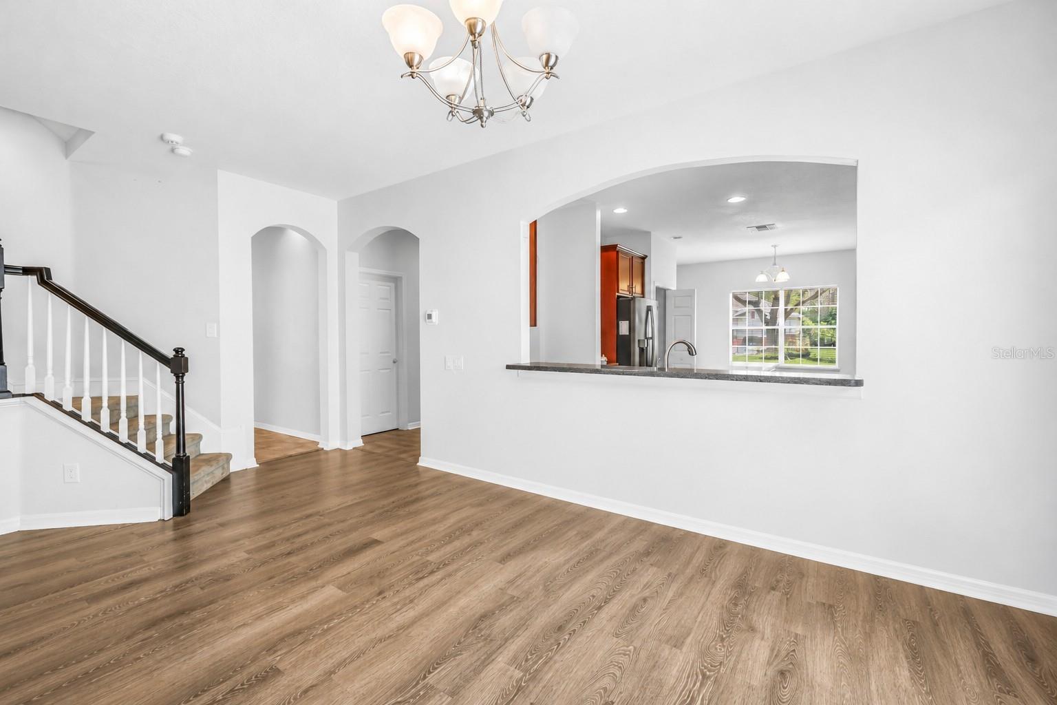 Dining Area With View Into Kitchen