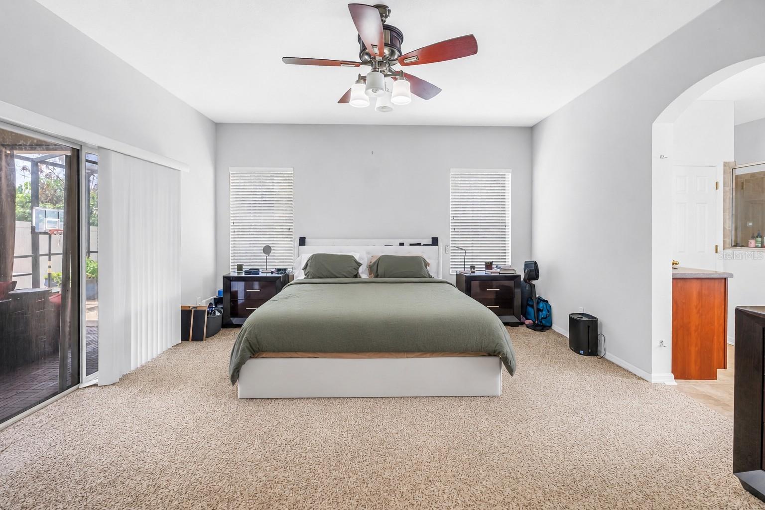 Primary Bedroom With Sliders to Covered Lanai