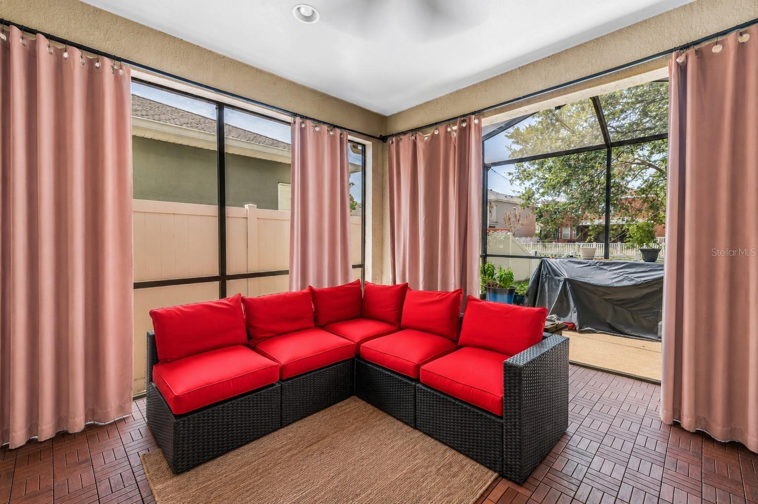 Covered Lanai With a View Into Open Lanai