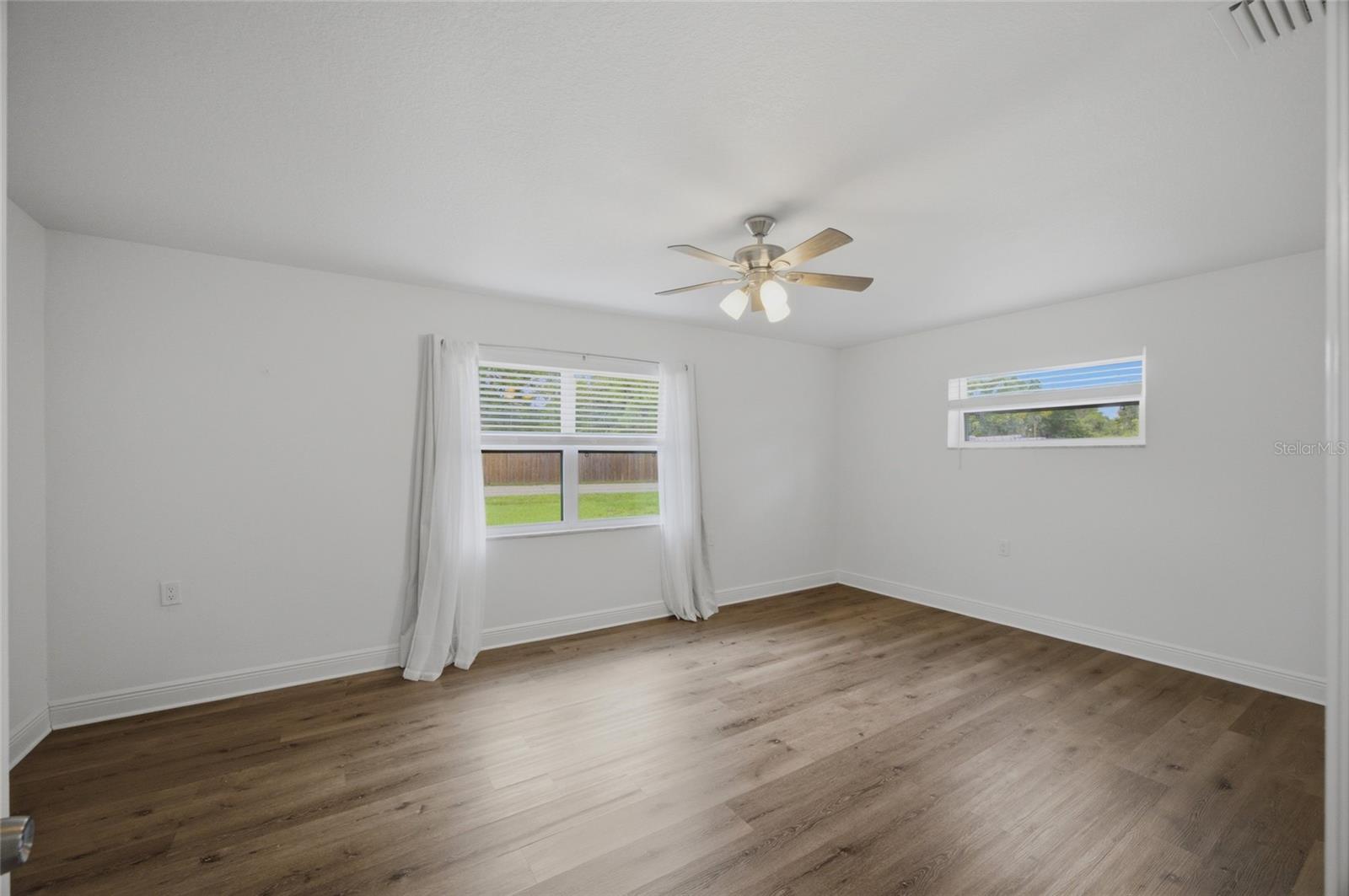 bedroom one is very spacious and could be a great playroom or guest room