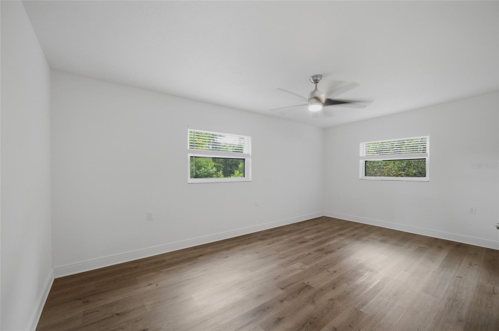 primary bedroom with lake views