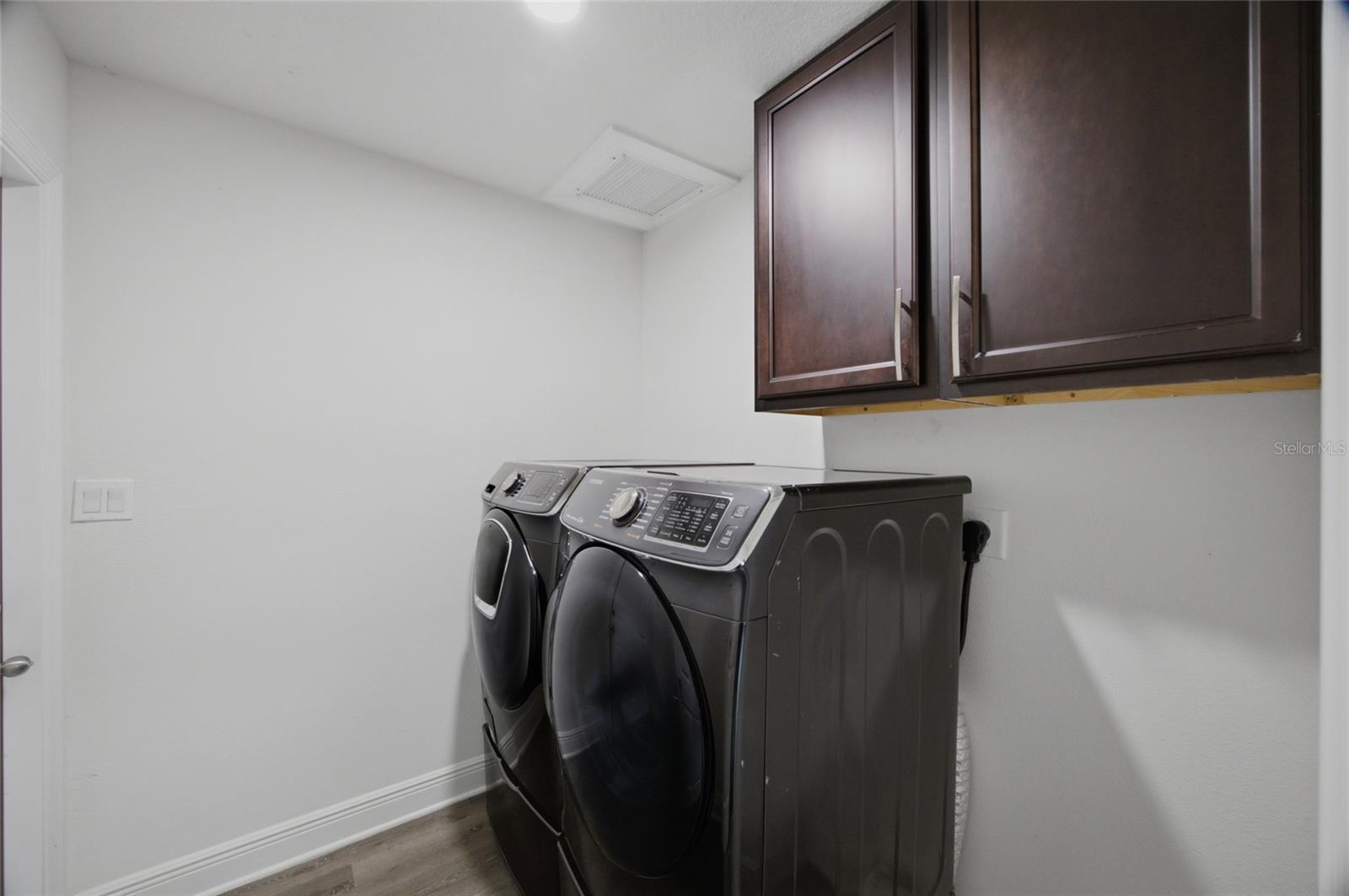 laundry room that leads out to garage