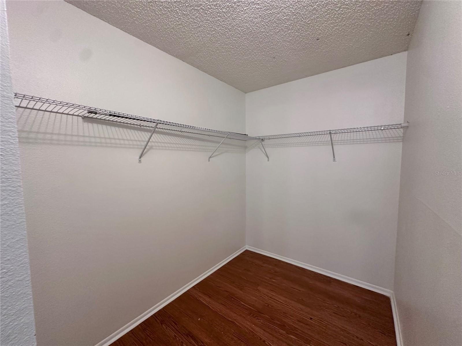 Primary Bedroom Walk in Closet