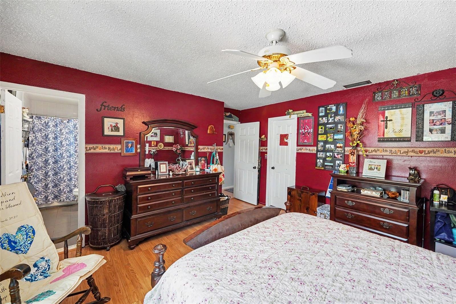The expansive master bedroom boasts an en-suite bathroom and a walk-in closet