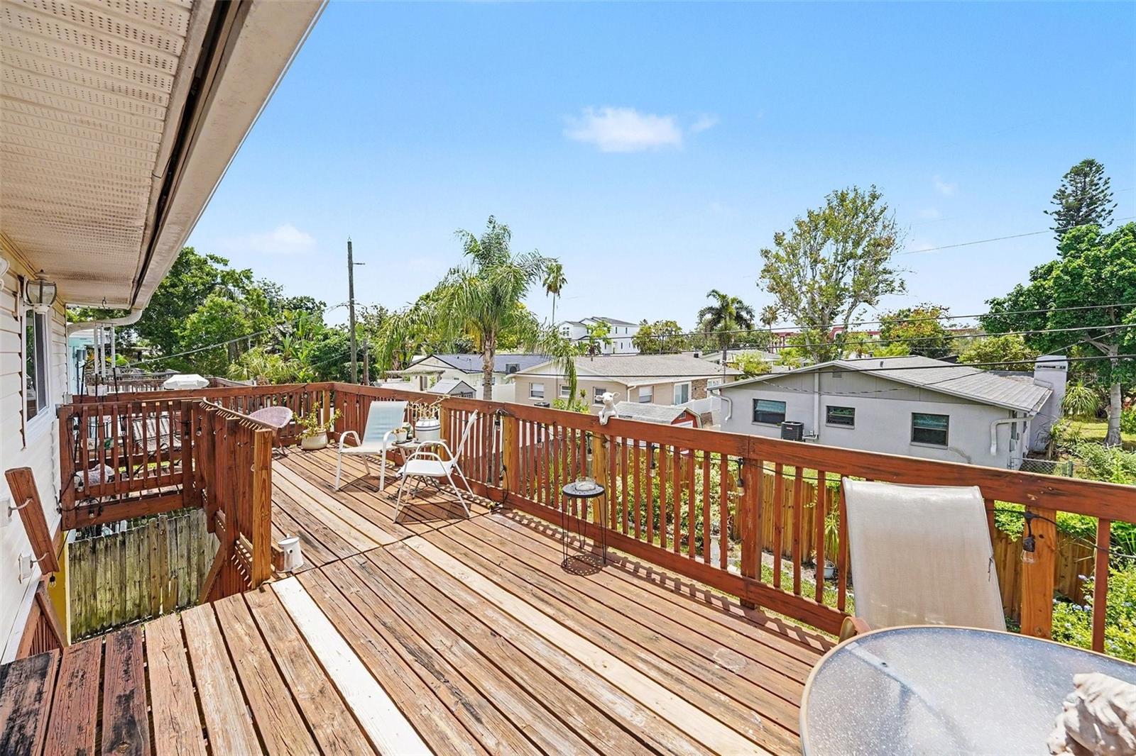 Spacious deck, perfect to enjoy your morning coffee or read a book.