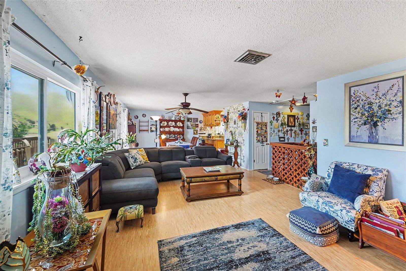 Open floor plan. The kitchen connects seamlessly to the dining and living areas.