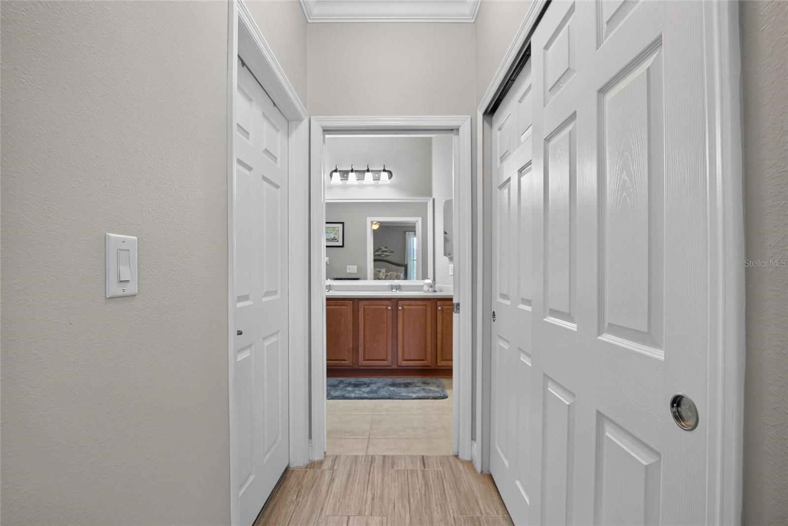 Entrance to master bathroom/double closets