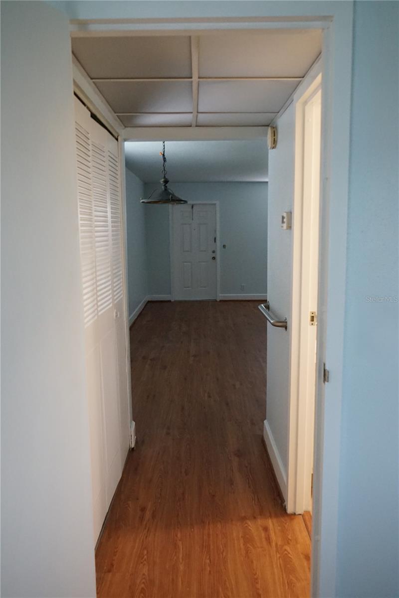 hallway has half bath and storage