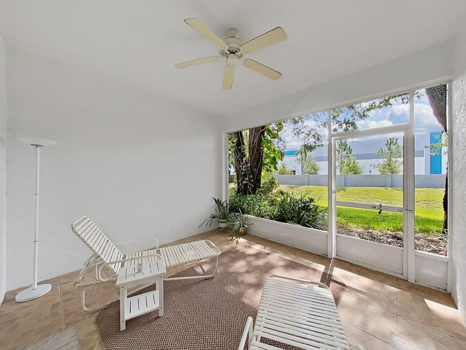 Lanai with view of backyard
