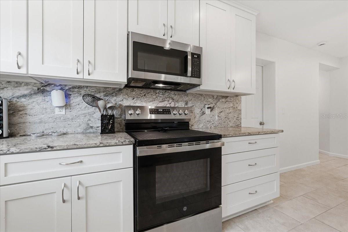 Stainless Steel Appliances and Granite Countertops in the Kitchen