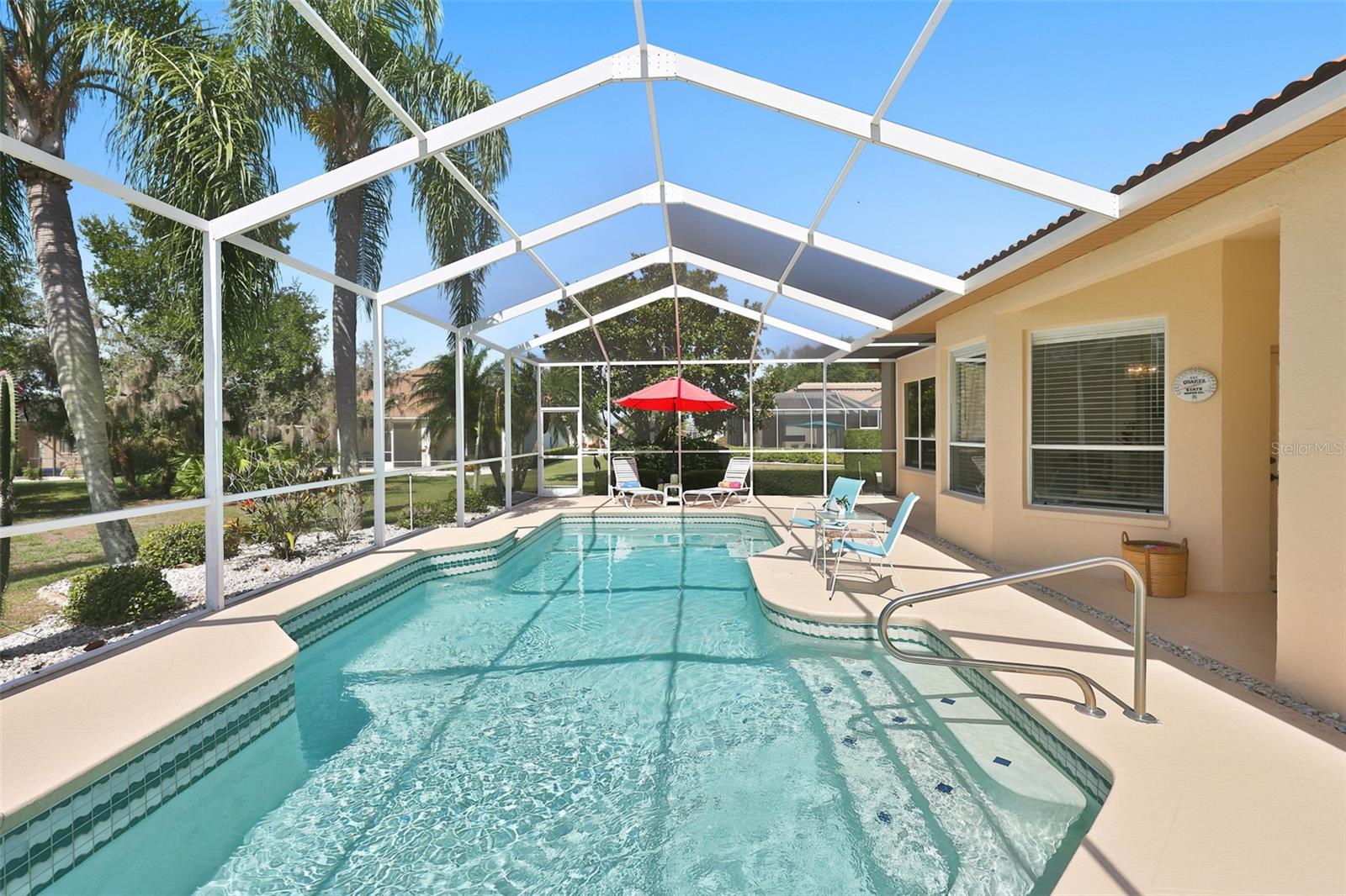 Move-In Ready, Luxury Resurfaced Pool, Side Sitting, Shelf, Expansive Screened Lanai, Open & Plenty of Green Space