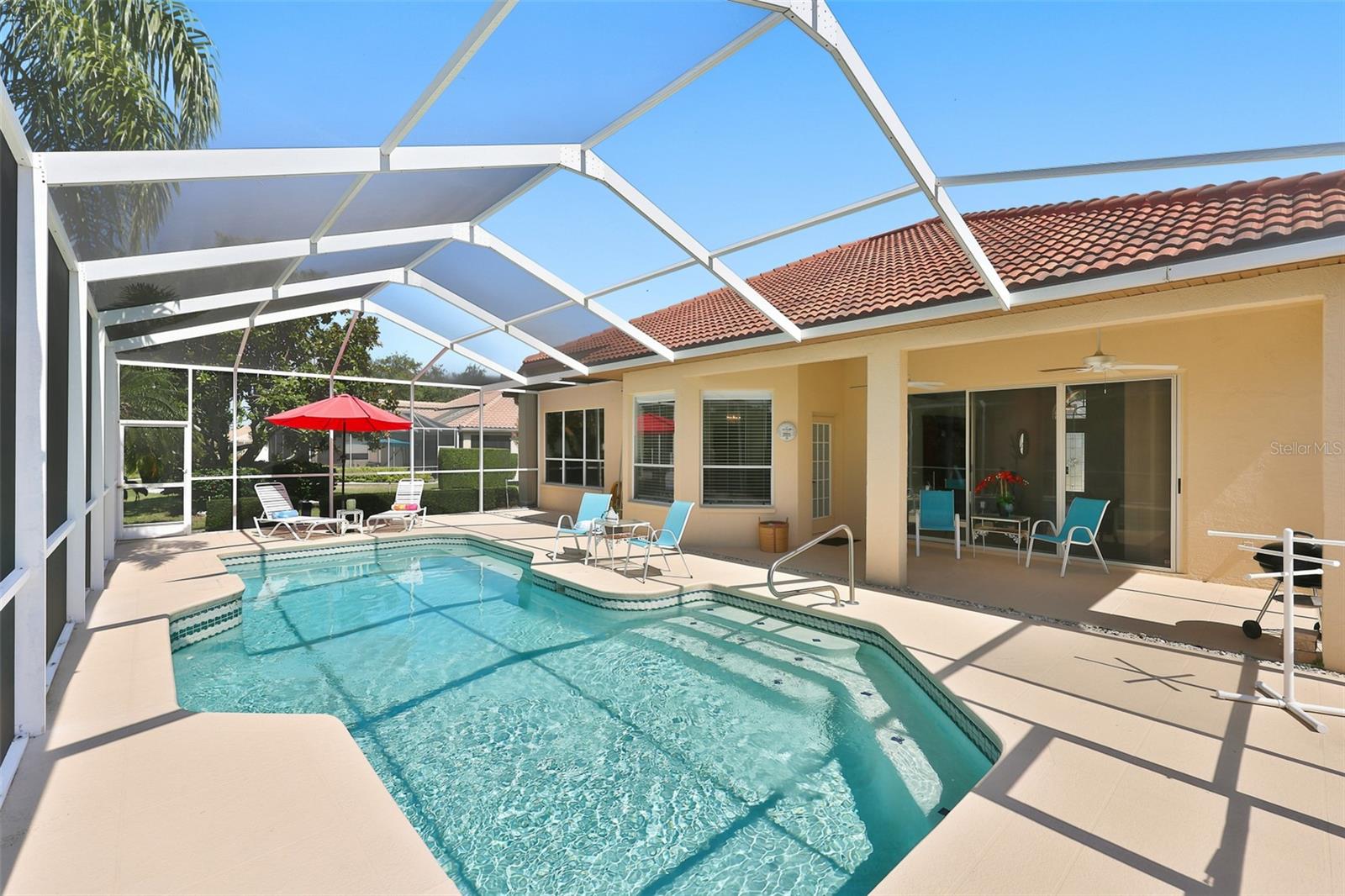 Inviting Resurfaced Pool, Painted Coolcrete Pool Deck, Large Screened Lanai