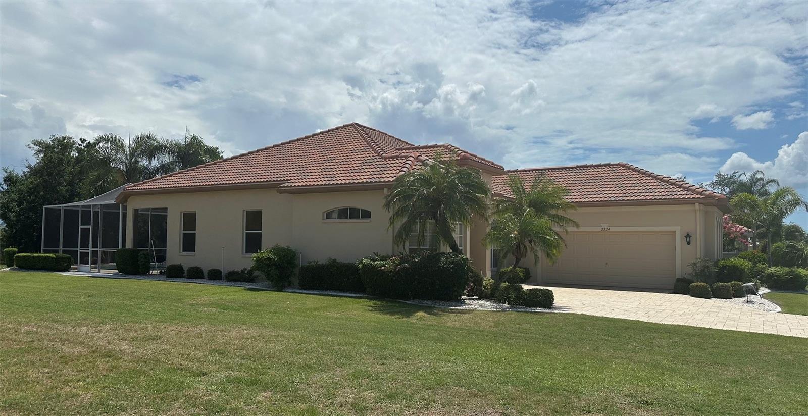 Beautiful Newer Tiled Roof, Exceptional Curb Appeal, Exterior Painted. Side Facing Garage & Pavered Driveway