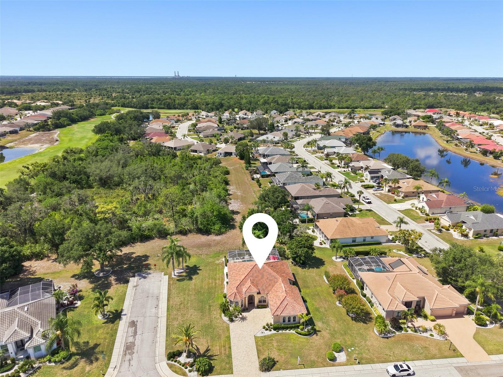 Aerial, Newer Tile Roof, Large Corner Lot, Paved Driveway, Oversized 2+ Car Garage