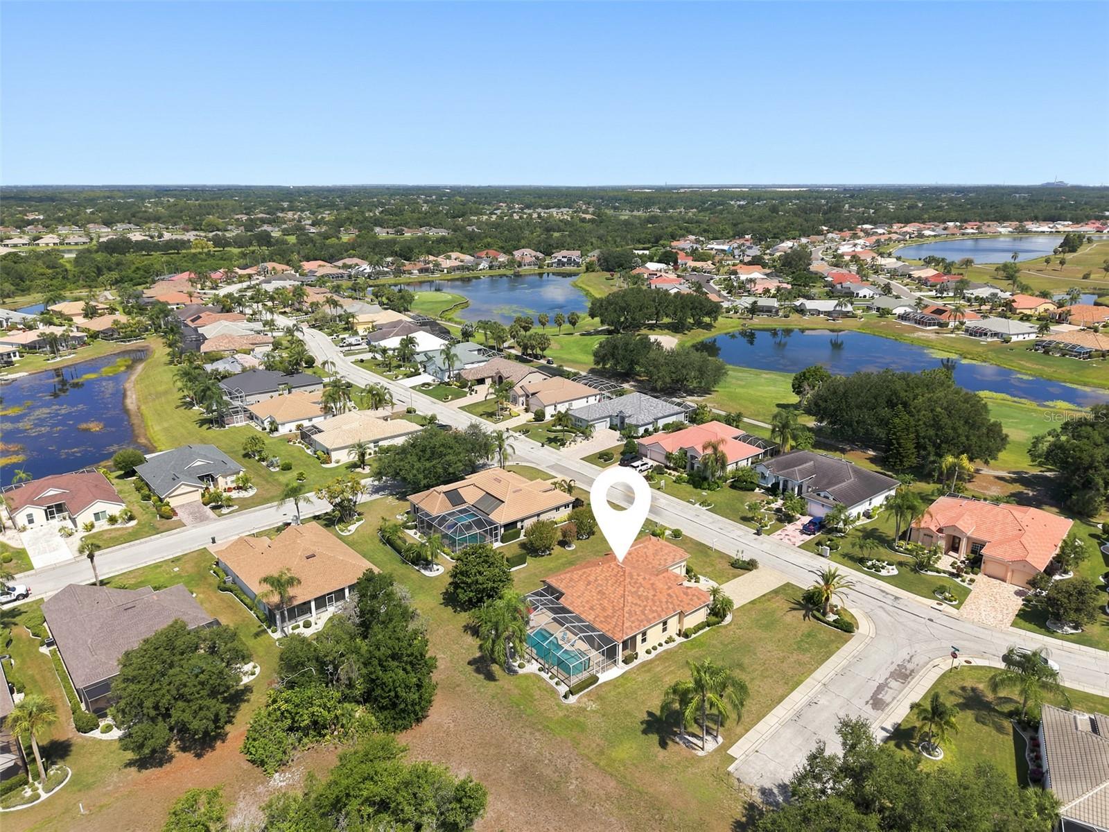 Aerial, Newer Tile Roof, Large Corner Lot, Paved Driveway, Oversized 2+ Car Garage