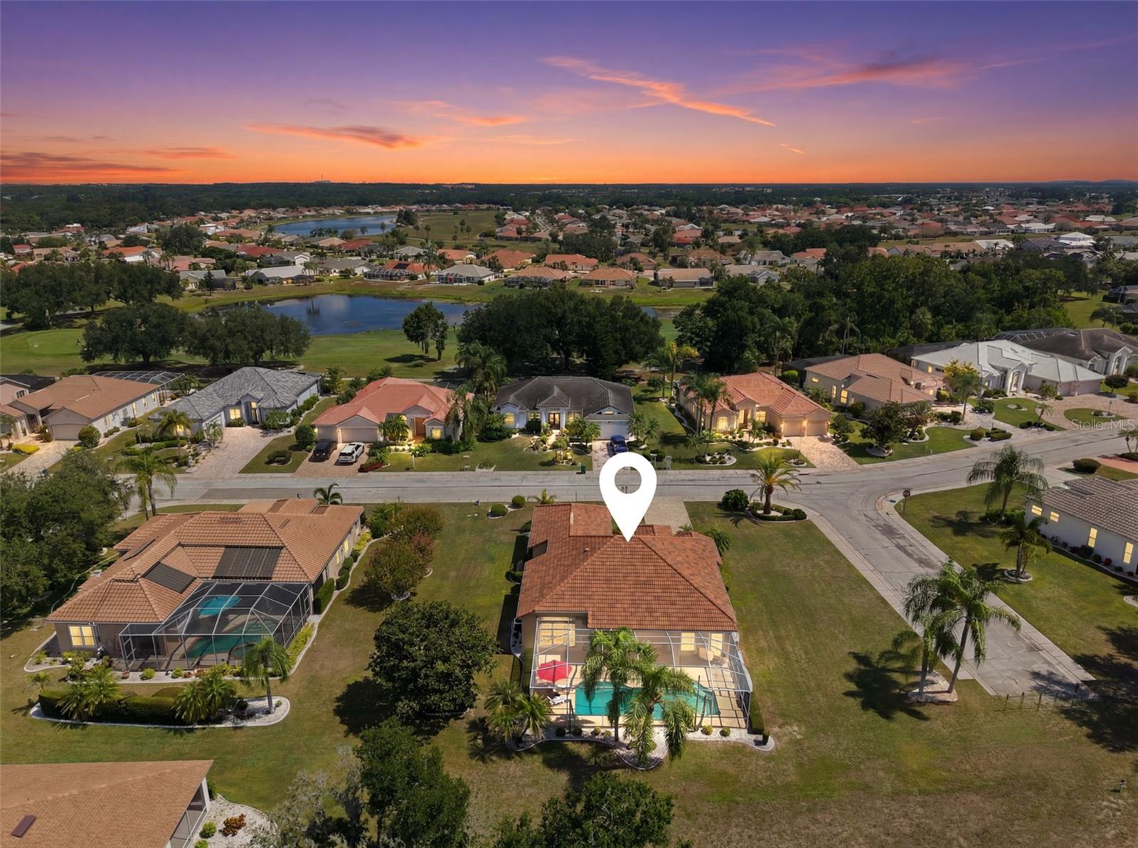 Twilight Aerial, Newer Tile Roof, Large Corner Lot, Paved Driveway, Oversized 2+ Car Garage