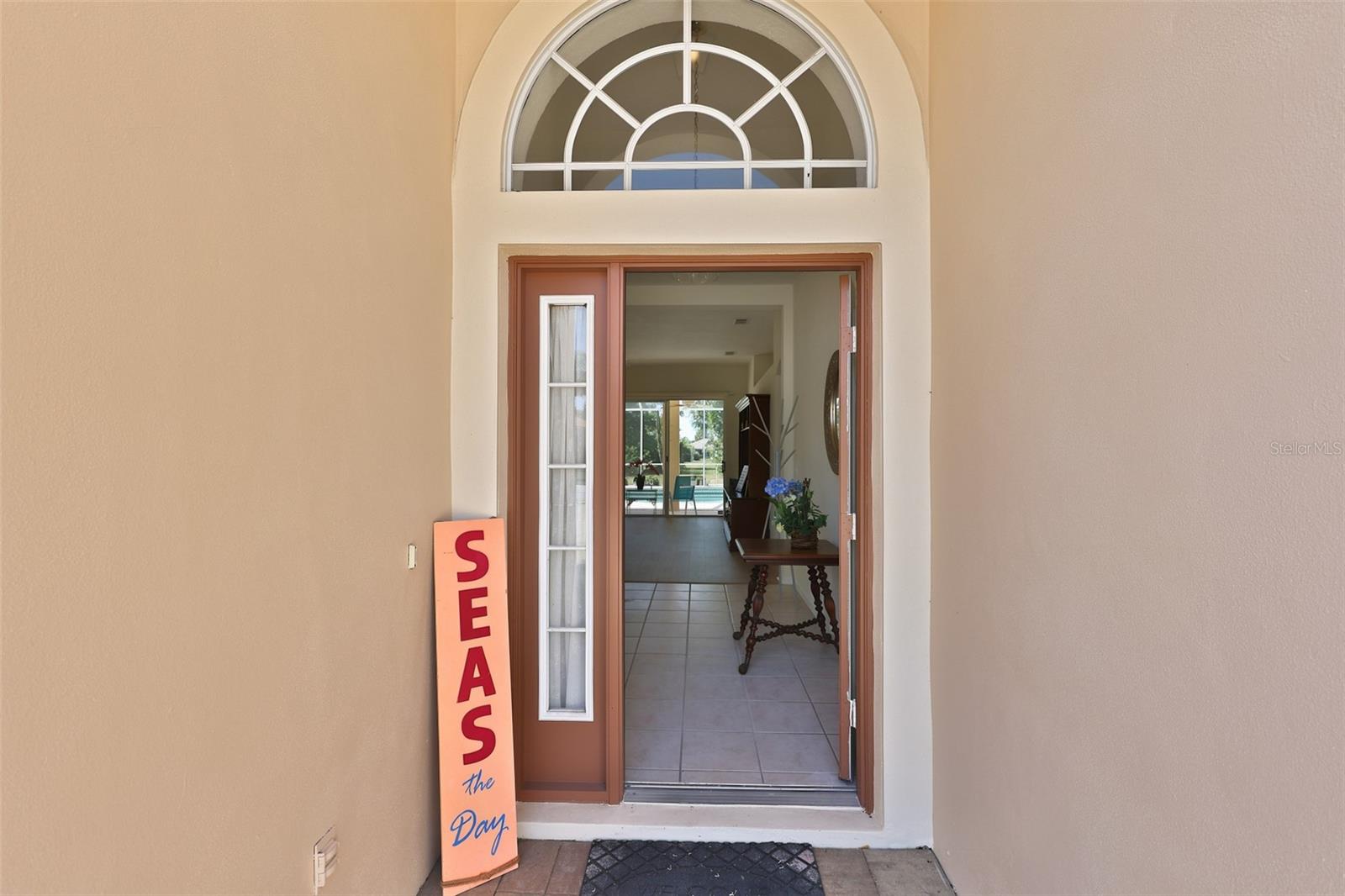 Lovely Tiled Entry with Immediate View of Fabulous Pool & Outdoor Space, Freshly Painted Interior July 2026
