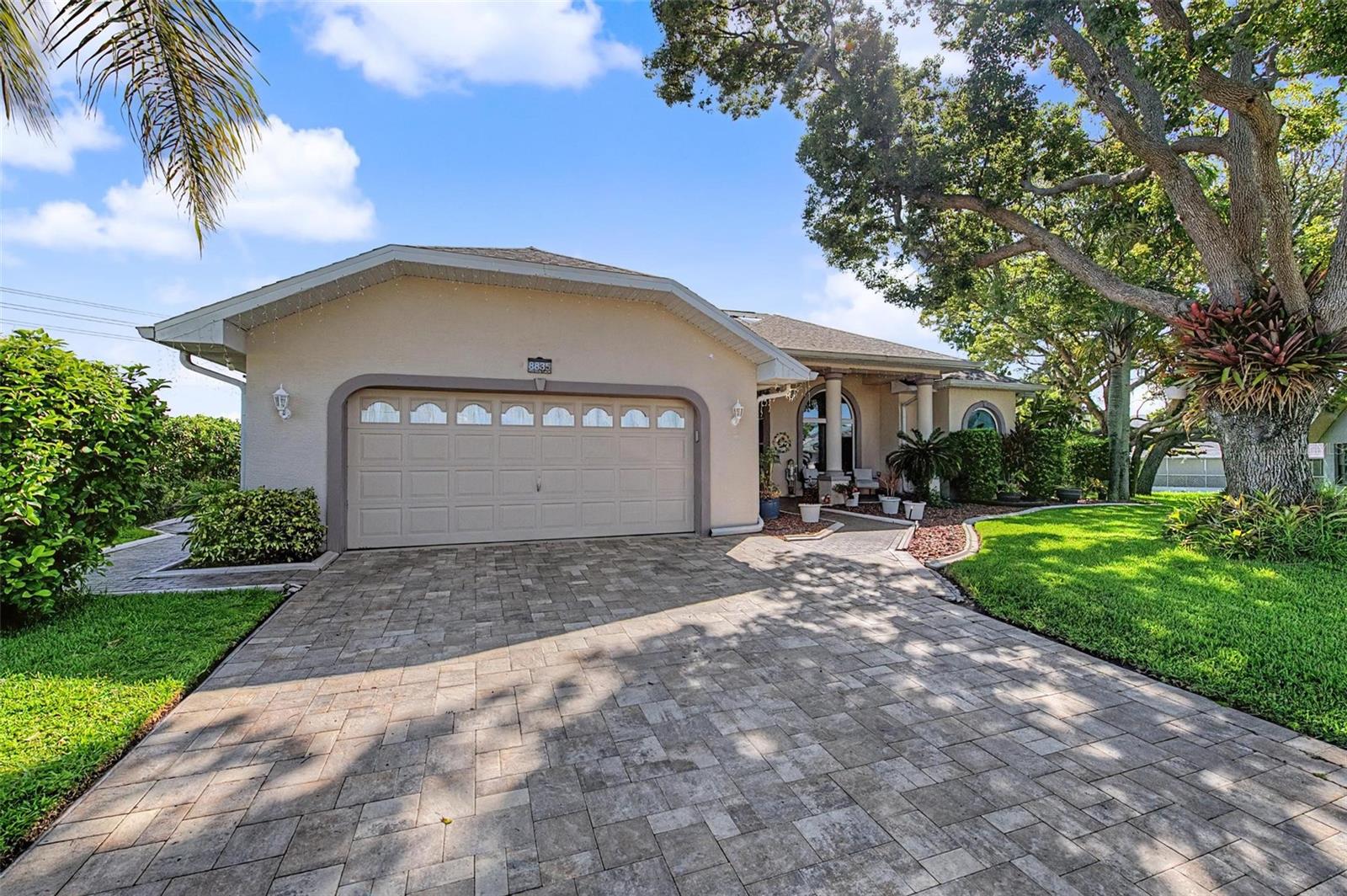 The oversized driveway offers plenty of parking for guests.