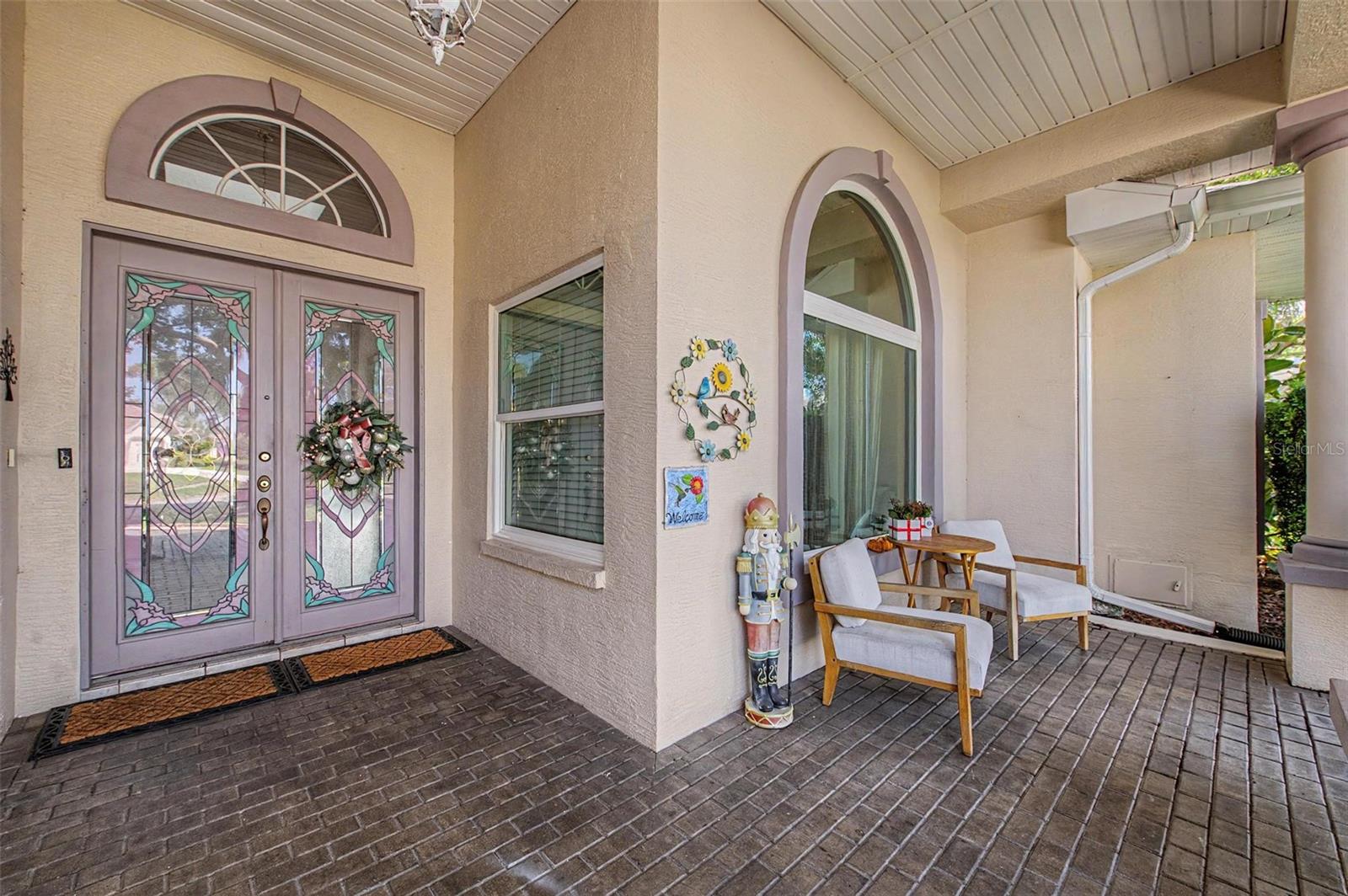 Front door and the front porch.