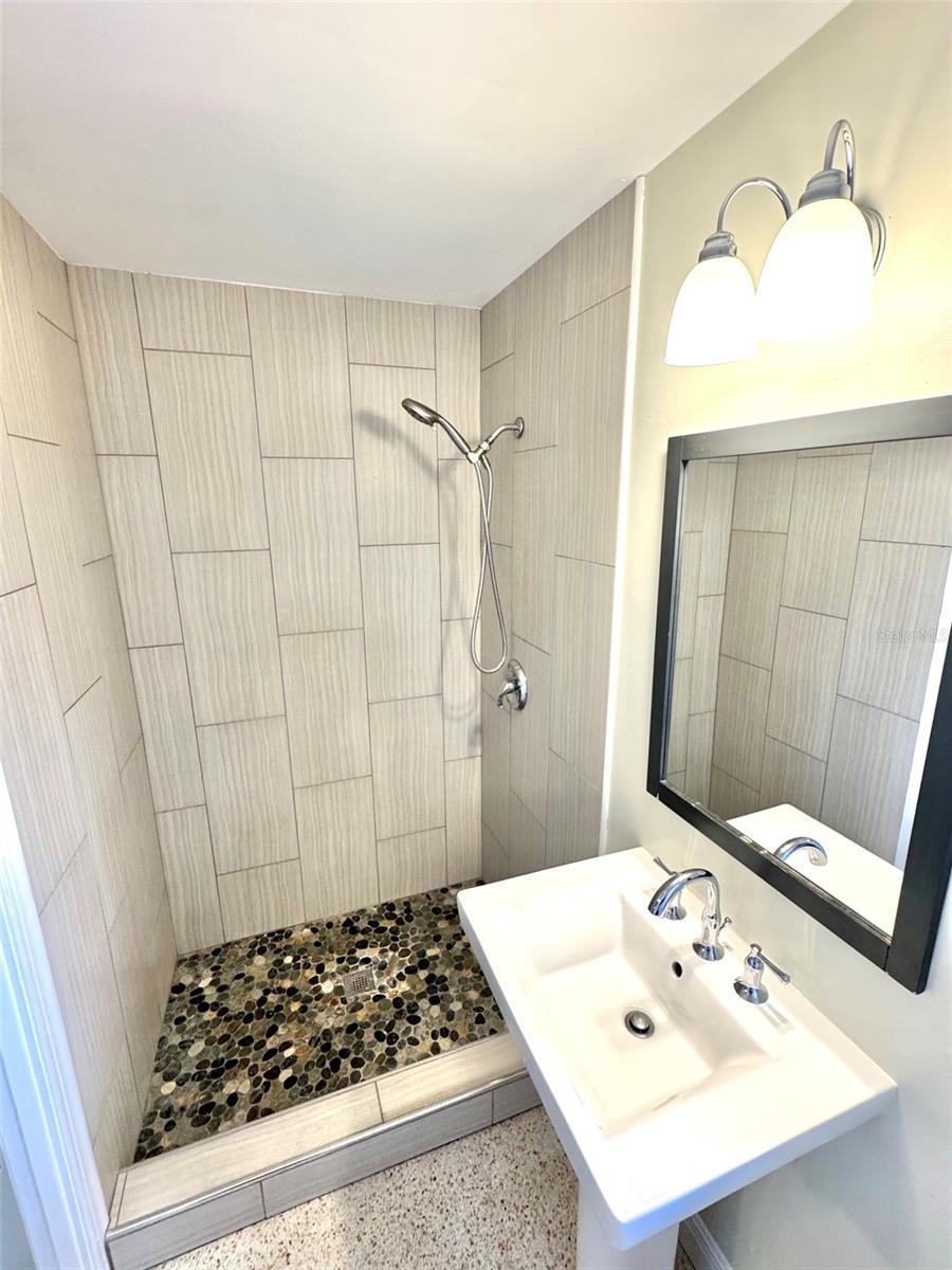 Updated bathroom with pedestal sink