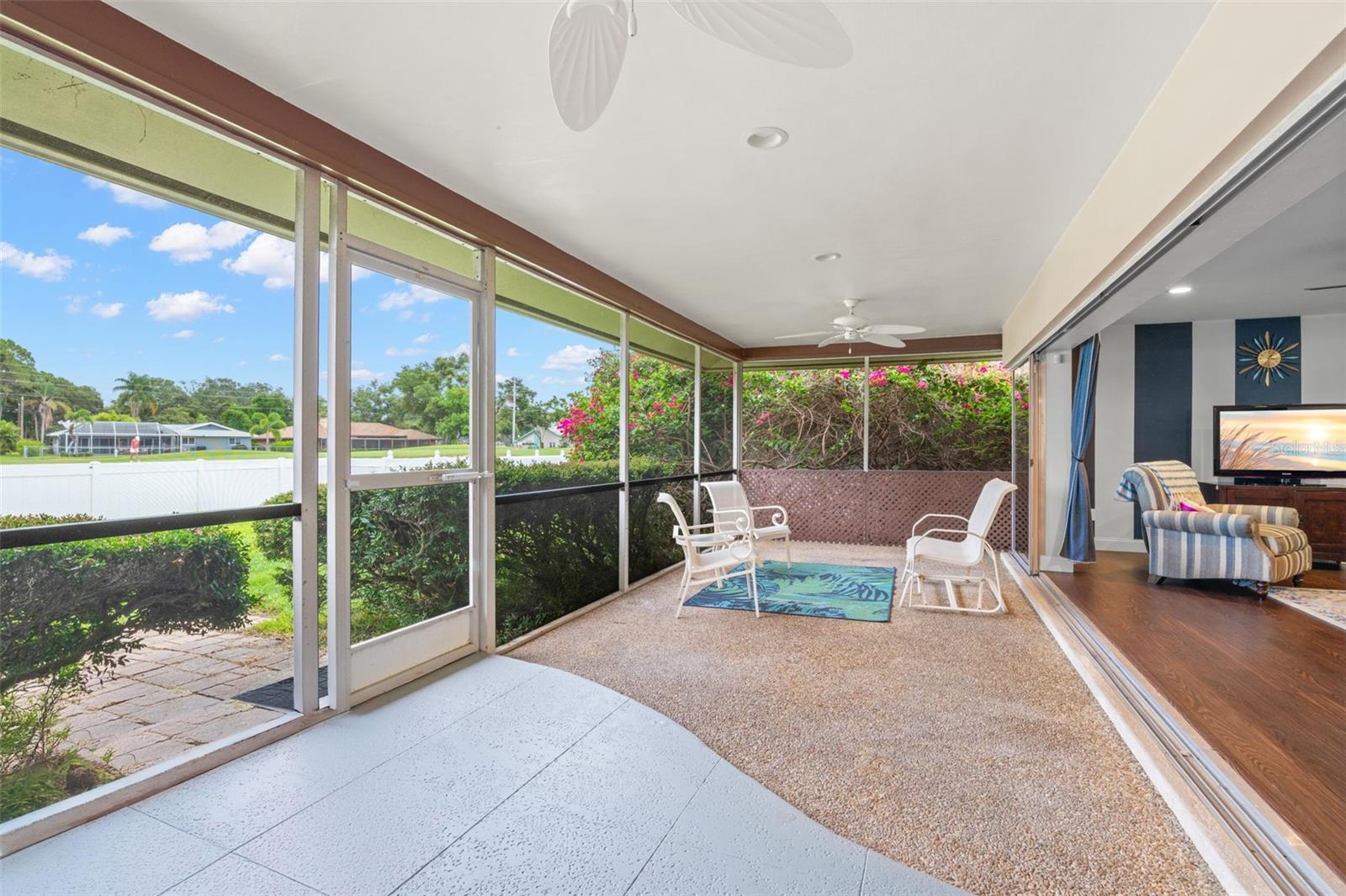 Screened lanai overlooking golf course