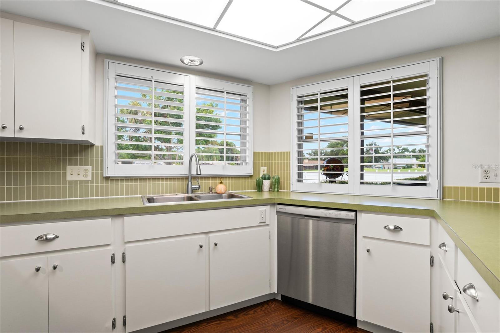 Kitchen with breakfast bar and golf course view