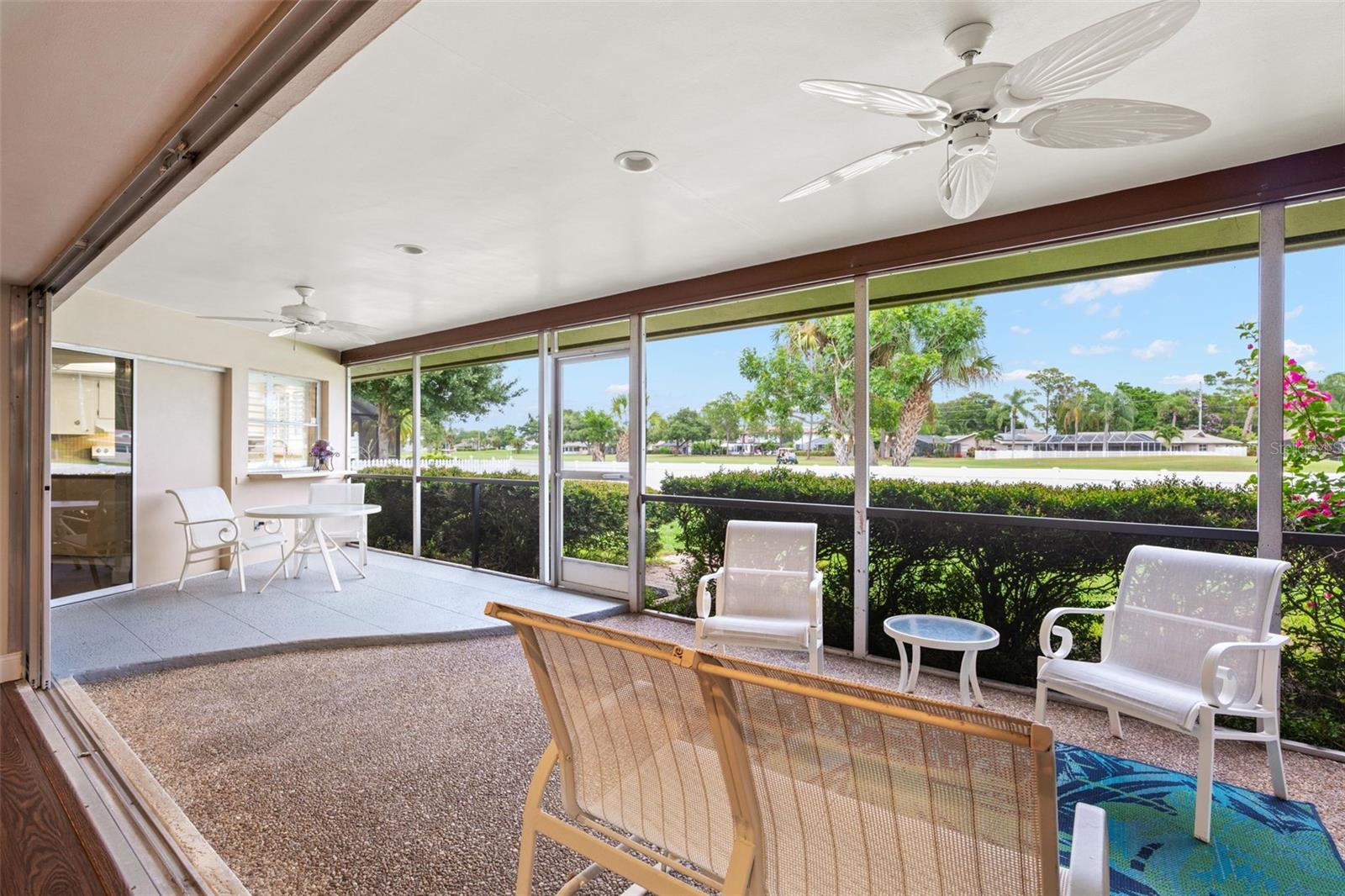 Screened lanai overlooking golf course