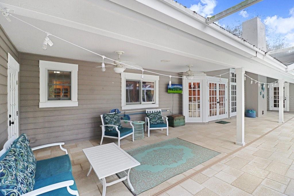 Another view highlighting the French doors around the entire back of the house.
