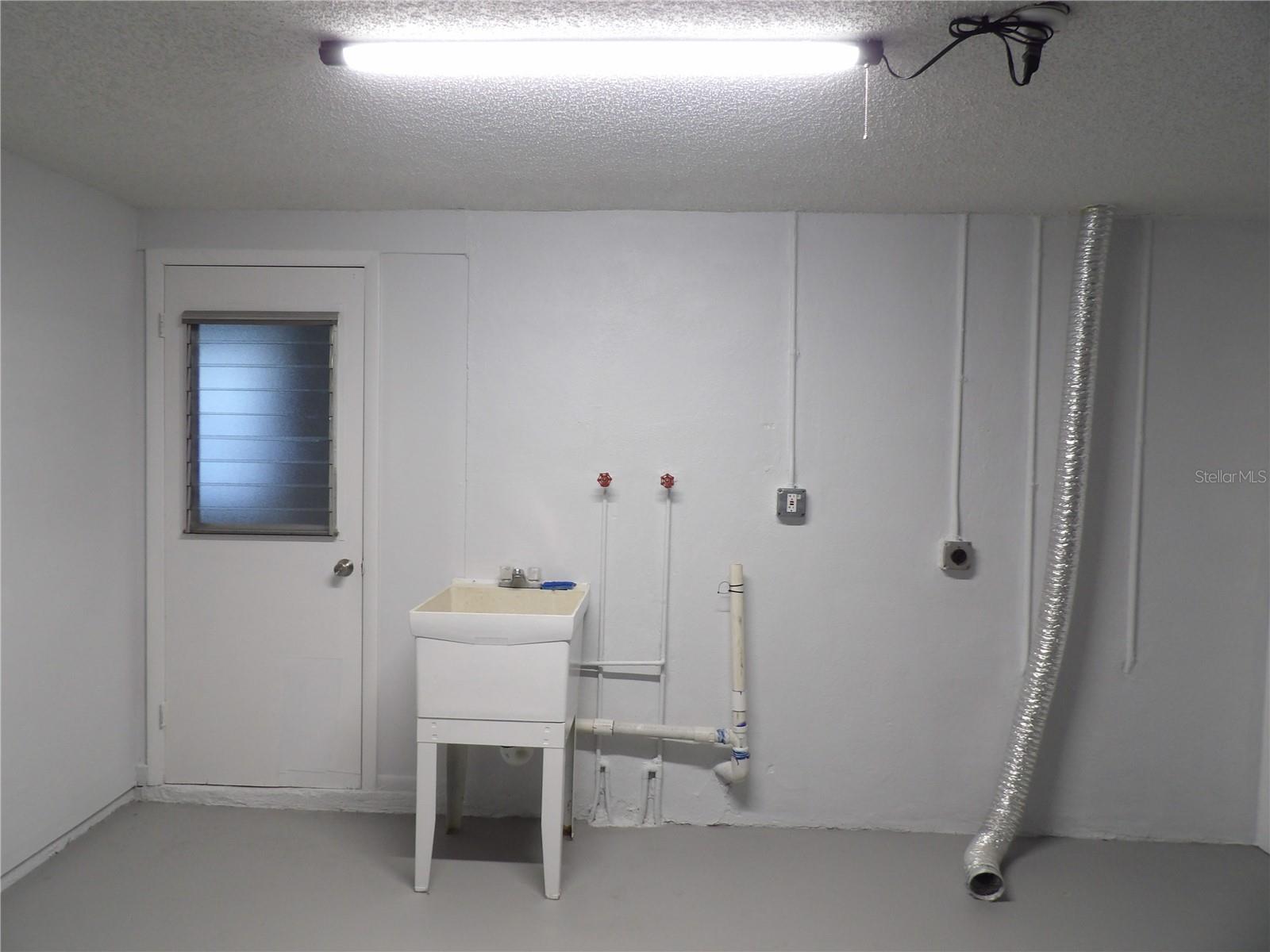 laundry hook ups Washer, dryer and sink