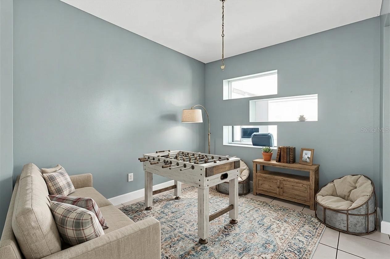 bonus room 2 virtual staged as game room option or can be converted to a 4th bedroom