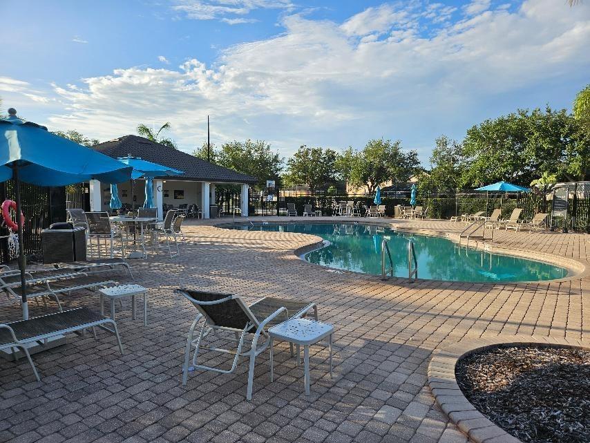 COMMUNITY POOL HAS CLUBHOUSE TOO