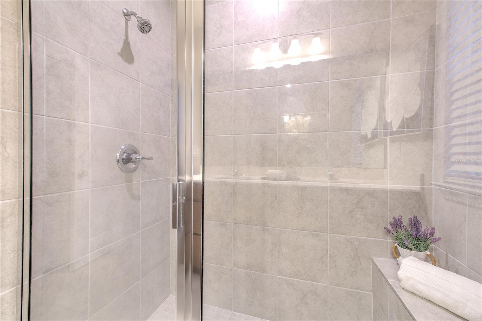 Primary Bathroom Shower with Bench Seat