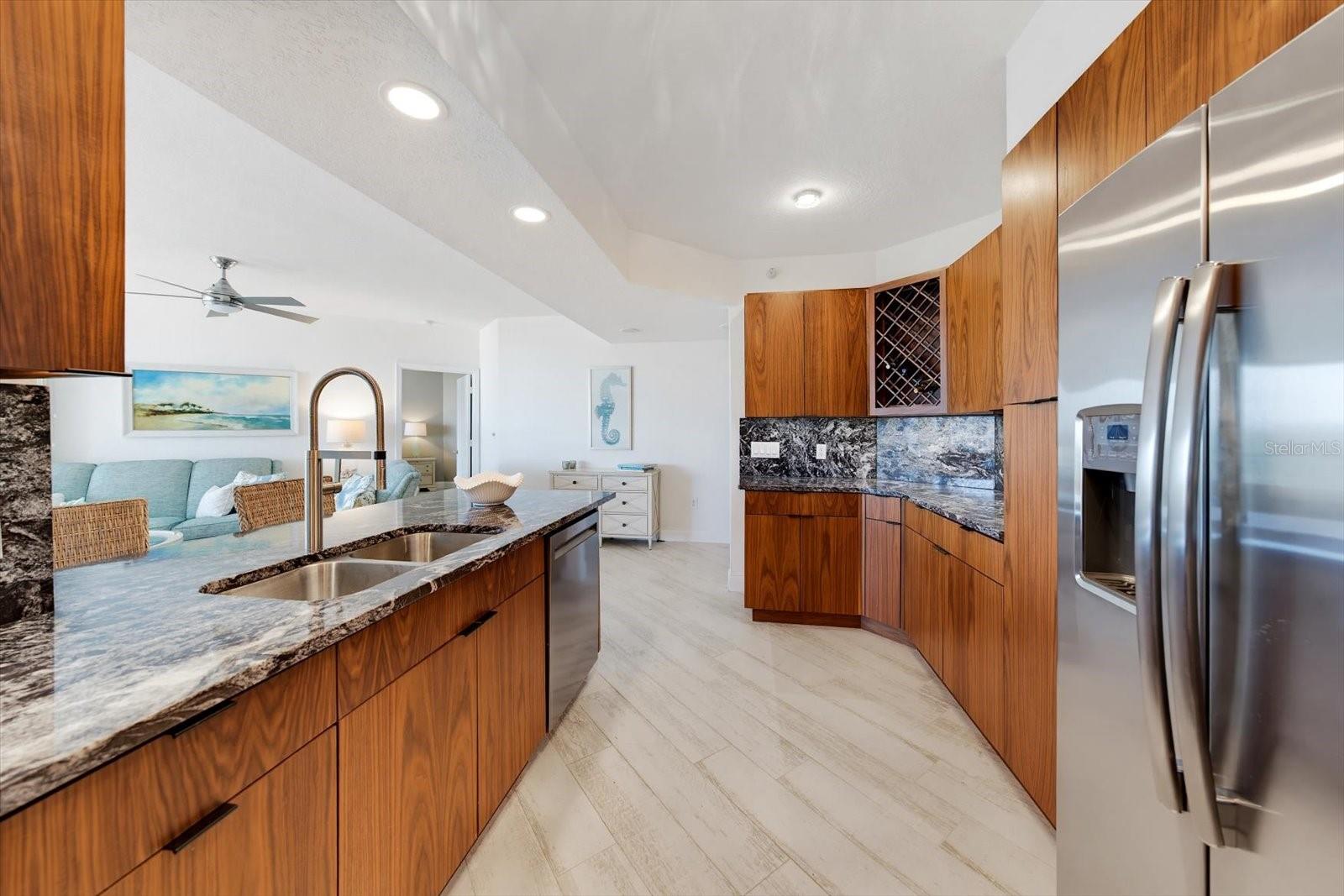 This kitchen is a chef's delight with stainless steel fridge featuring french doors & ice maker & topped off with the dishwasher ready to clean up the cookware.