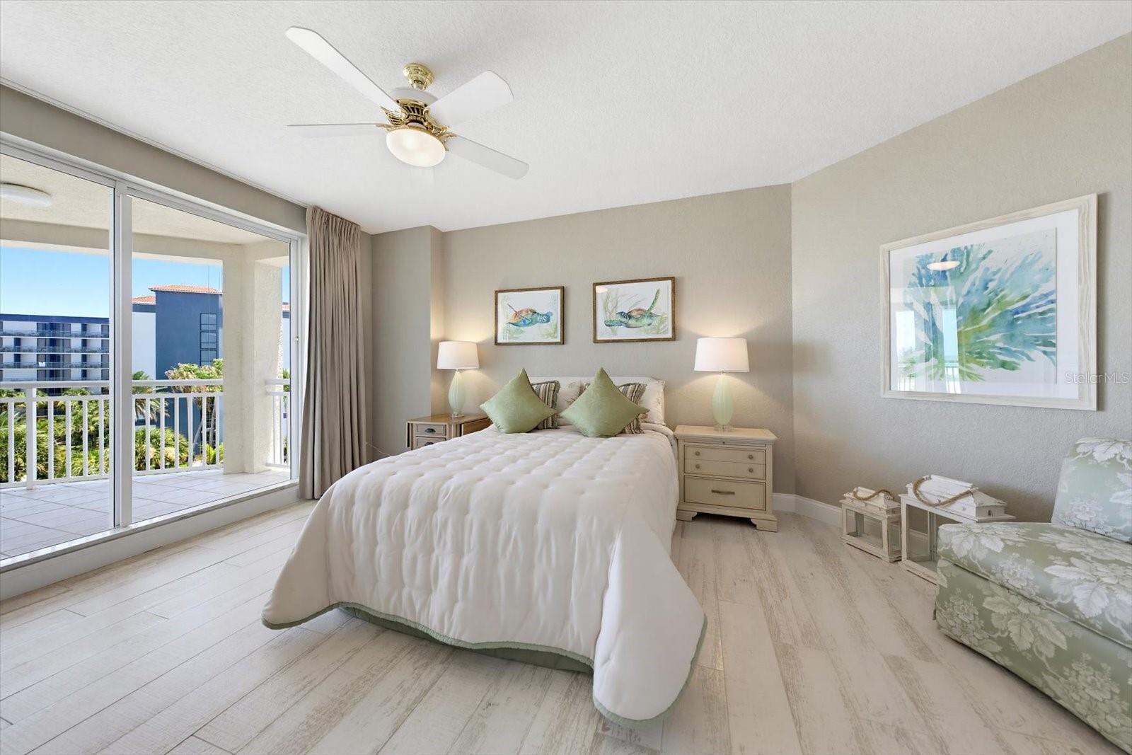 Primary suite furnished with queen size bed, black out drapes & well appointed furniture.