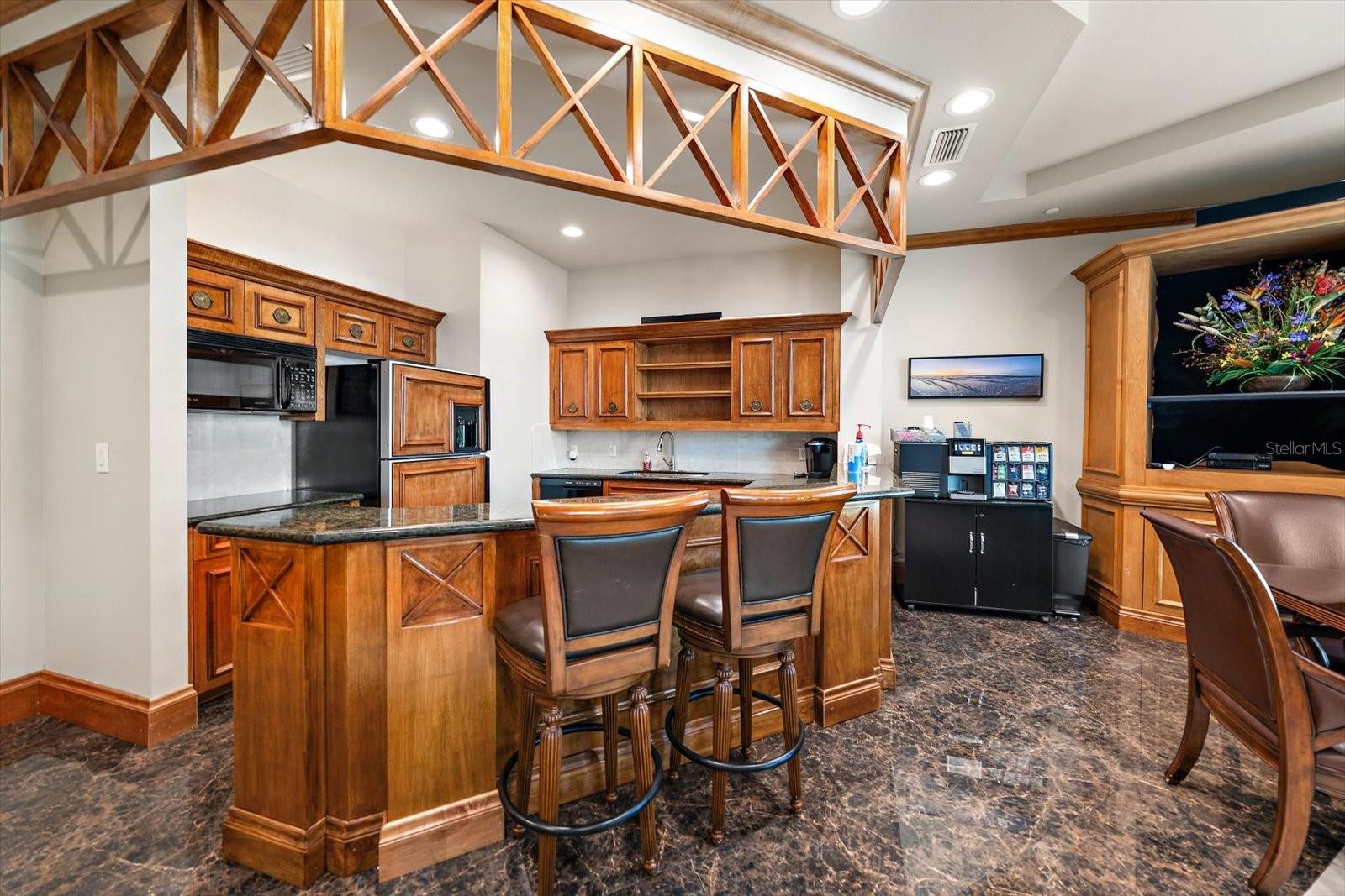 The perfect spot for an afternoon beverage or a indulging night cap without ever leaving the building. Gather friends or family to share a sip at "home"