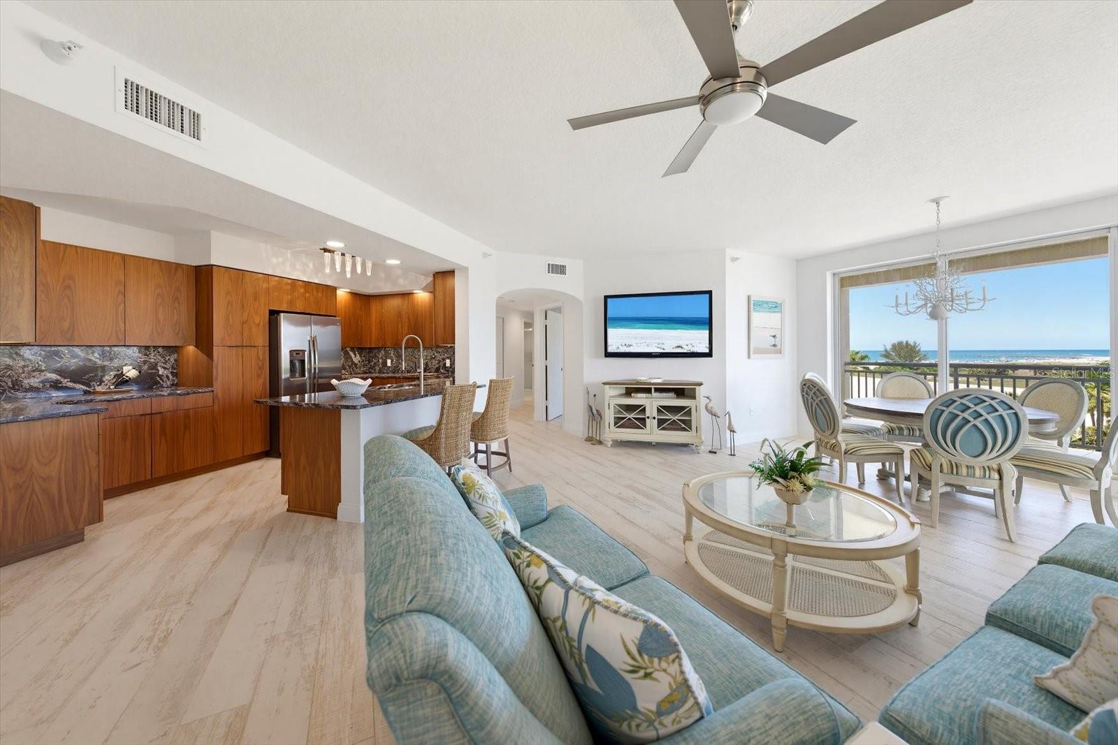 The open living room space provides the perfect place to gather & converse from this space.
