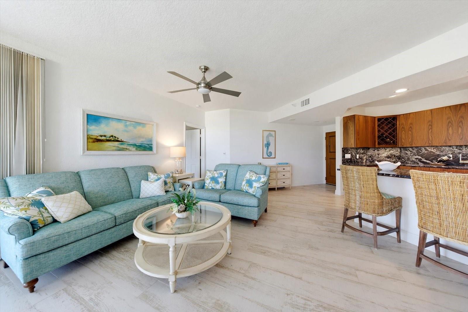With this open floorplan, this home feels light, airy & coastal. A perfect place to relax or gather.