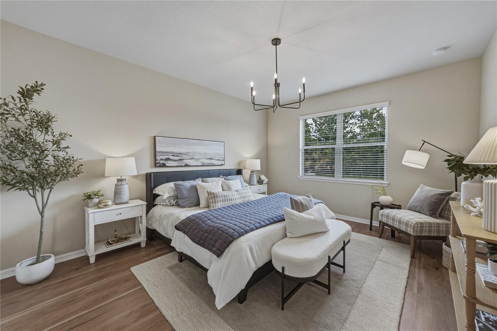 Downstairs Primary Suite with Beautiful LVP Floors