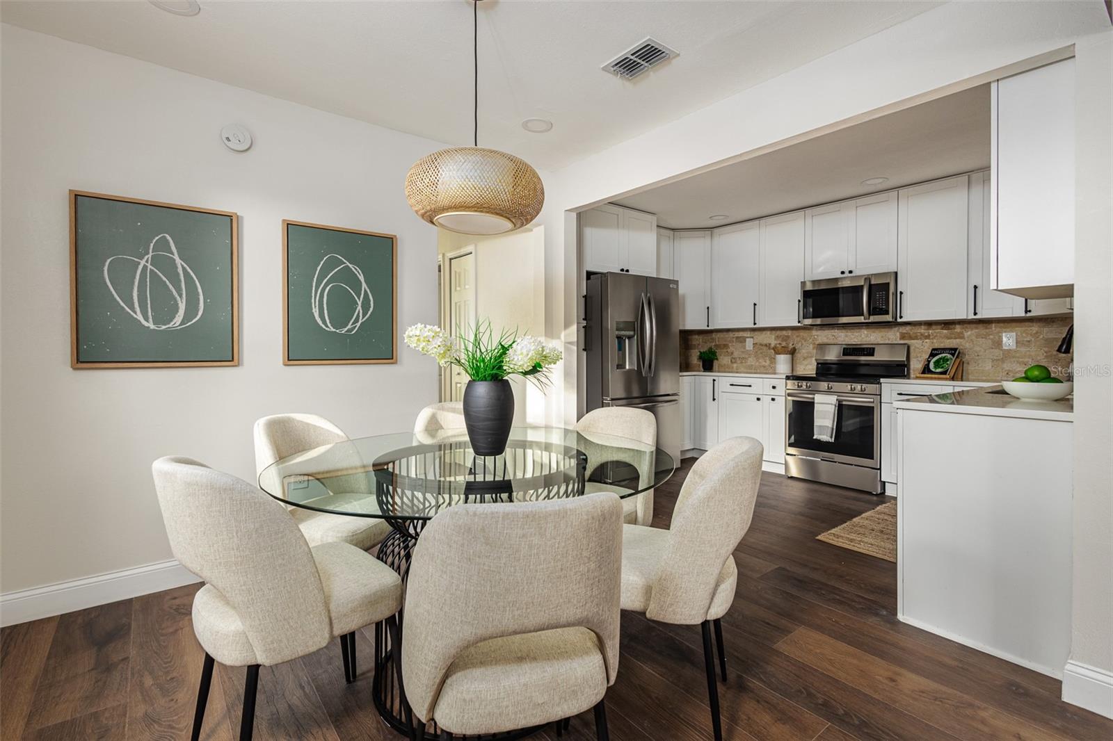 Kitchen dining combo previously staged