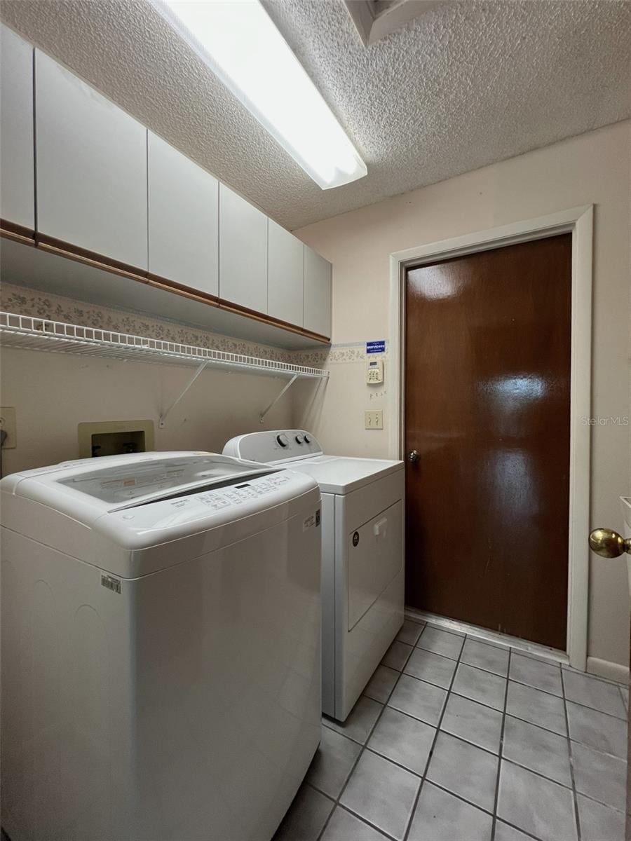 inside laundry room - washer & dryer remain