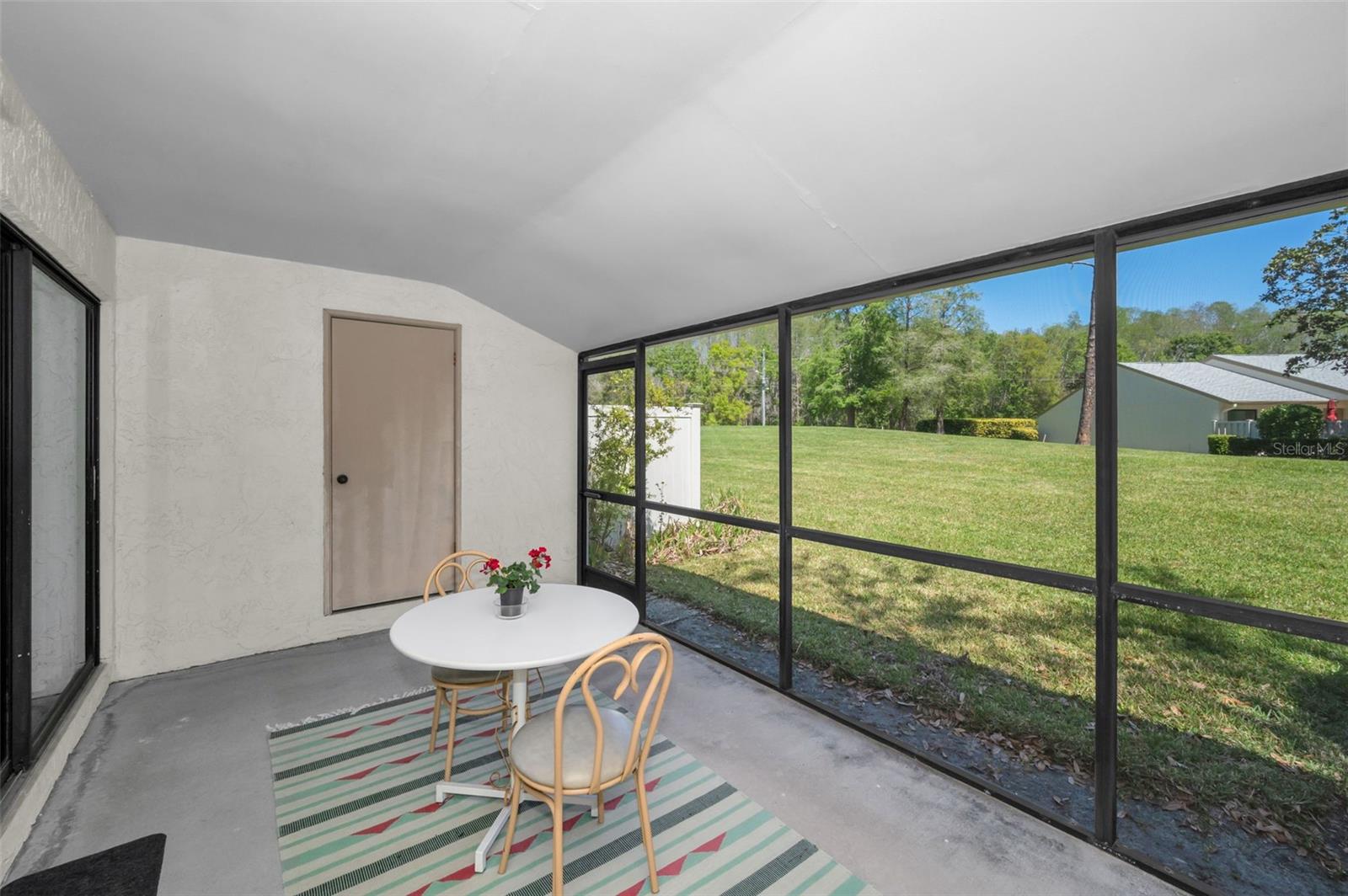 Screened-In Patio With Storage Closet