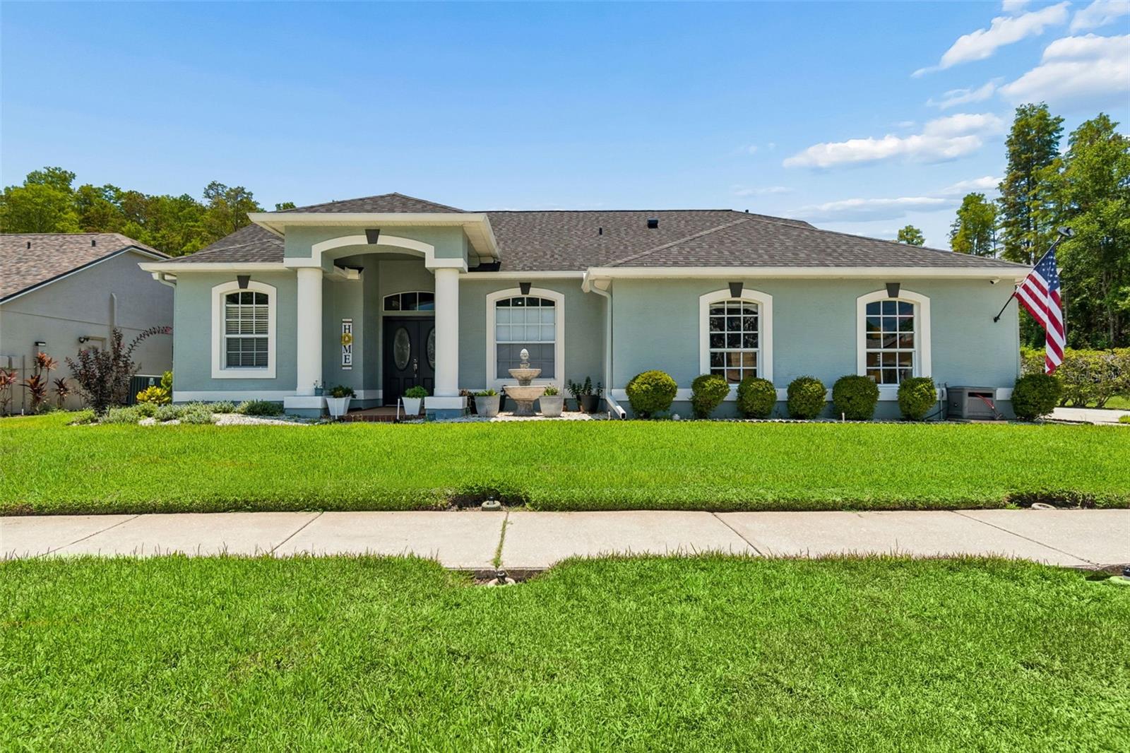 Spacious 3/2 with side entry 2 car garage on conservation lot!
